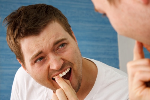 Odontología General: Cómo tratar un diente flojo | Sonrisas Felices